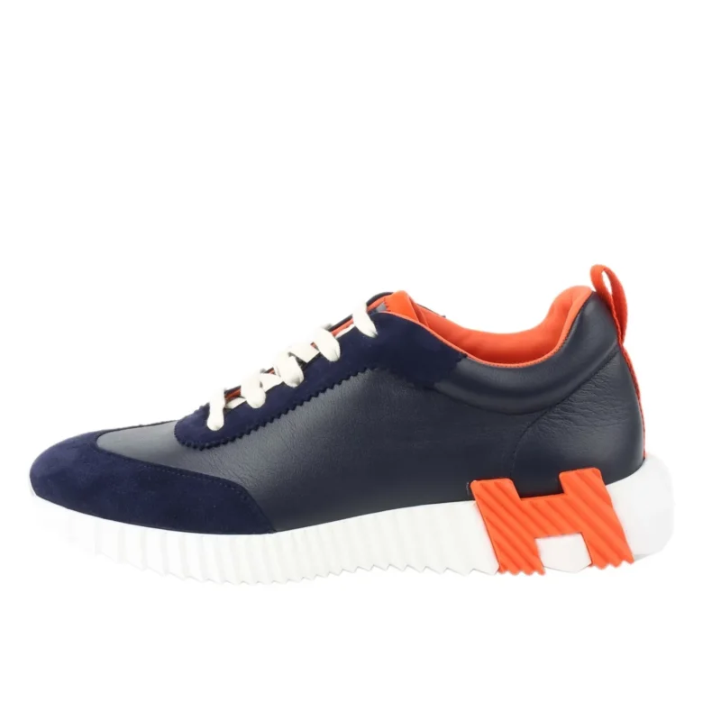 کفش زنانه هرمس بونسینگ Hermès Bouncing Sneaker با رنگ سرمه‌ای نارنجی و طراحی لوکس چرم طبیعی