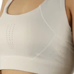جزئیات دوخت و منافذ نیم تنه ورزشی زنانه کرم کد 882